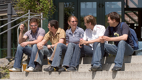 A group of students in front of the Main Lecture Theatre (Audimax)